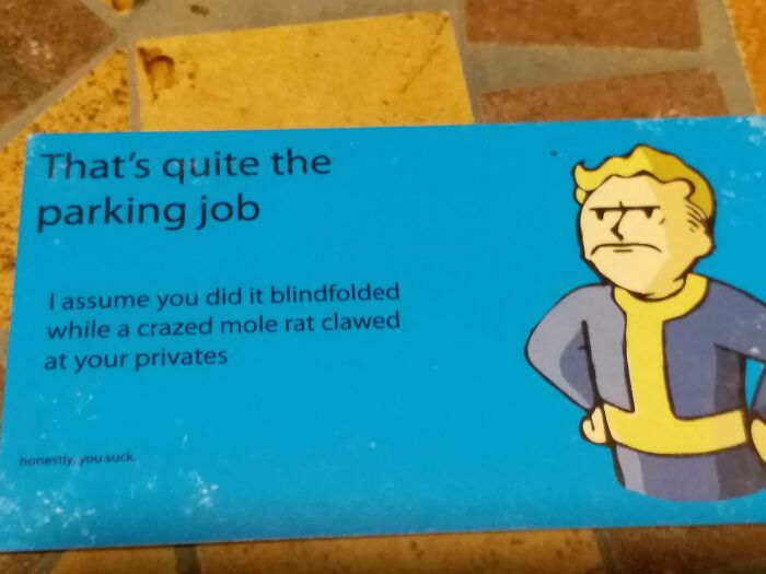 A card with a cartoon character and text criticizing an outrageous parking job.