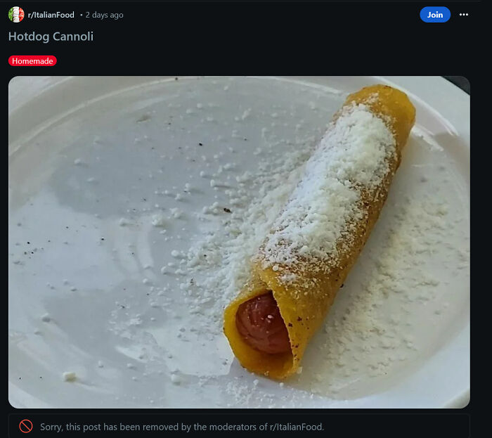 Hotdog cannoli, a stupid and disgusting food creation, with cheese sprinkled on top.