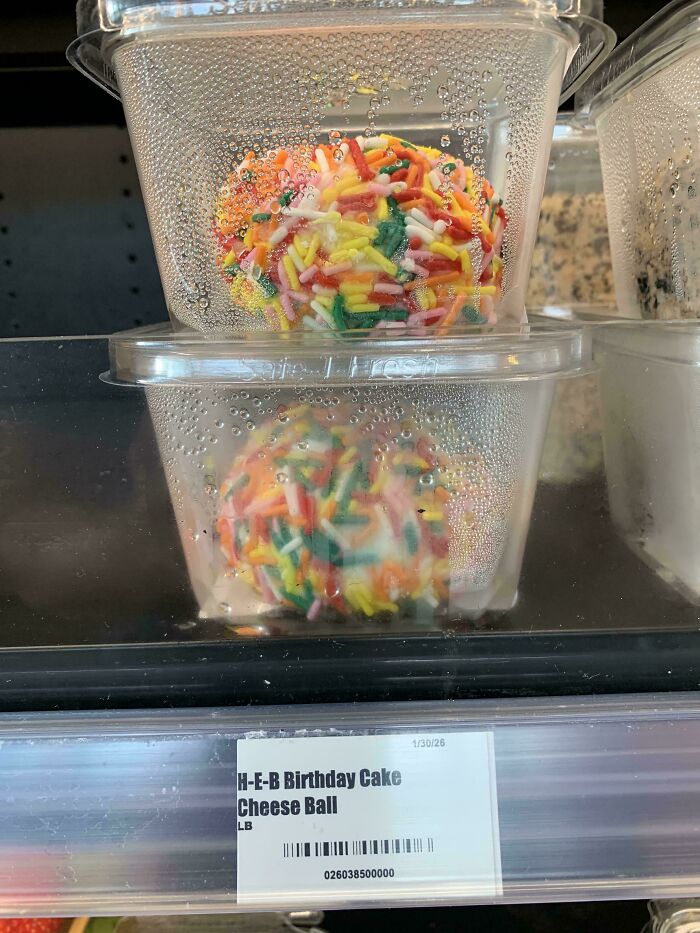 Disgusting food item: a birthday cake cheese ball with sprinkles in a plastic container.