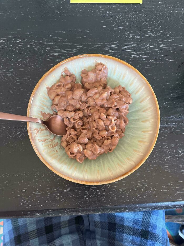 A plate of brown, lumpy, disgusting food resembling a peanut cluster or other confection. Publicly shamed.