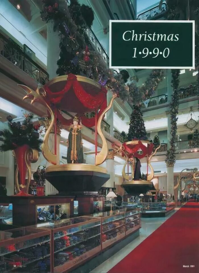 A grand department store decorated for Christmas in 1990, showcasing 90s holiday shopping experiences.