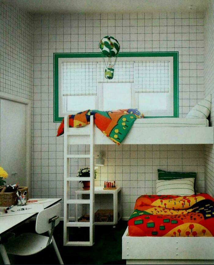 Children's bedroom featuring bunk beds and whimsical decor, capturing 1970s and 1980s interior design.