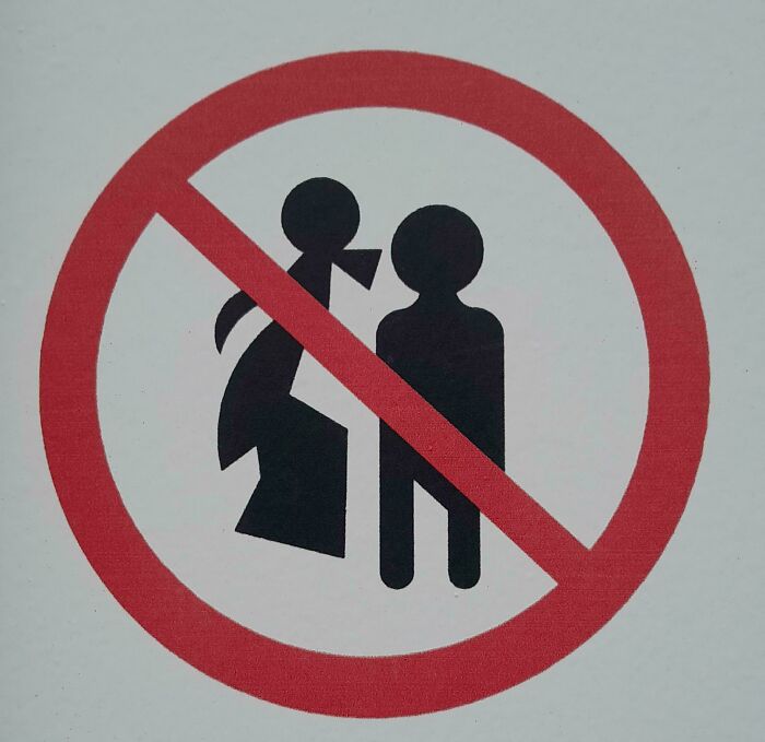 A red circle with a line through it, showing a person with a ghost-like figure, indicating a construction fail.