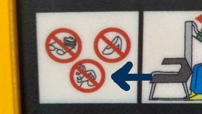 A sign with construction fails showing prohibited items like glasses, high heels, and a baby carrier.