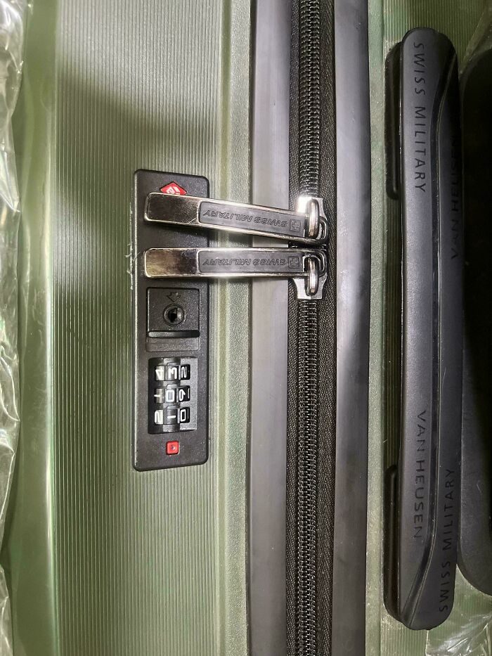A close-up of a luggage lock with a missing number, a common problem people ask for help fixing things related to travel gear.