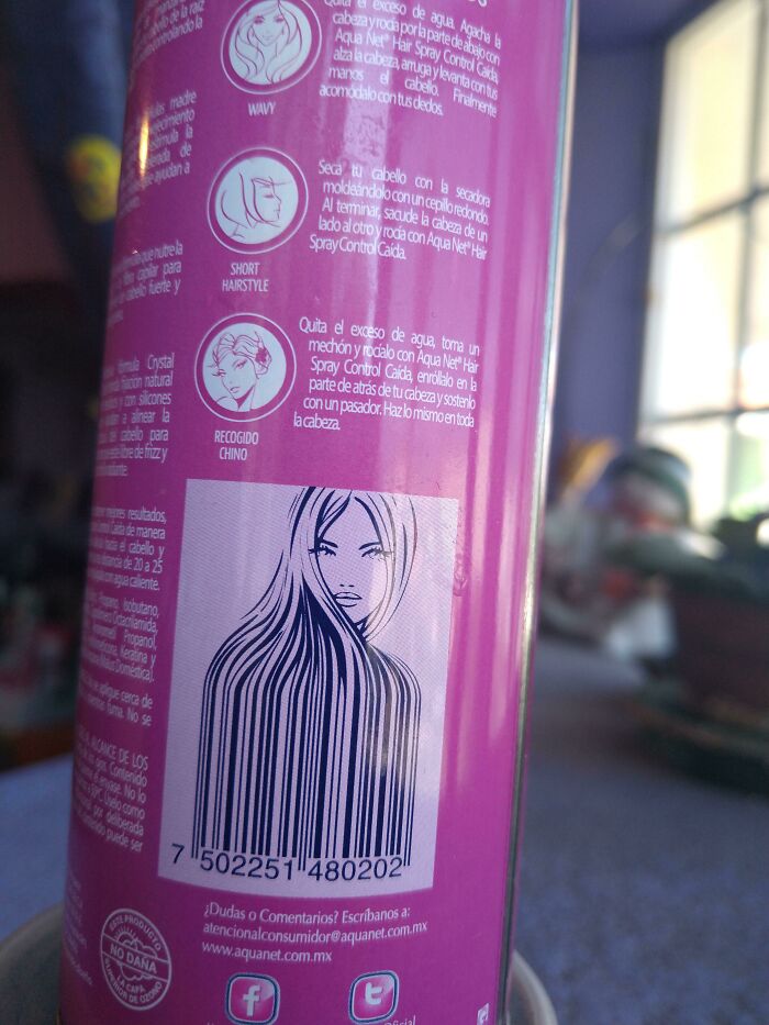 Hair product bottle with a barcode that designers transformed into a beautiful woman's flowing hair, making ordinary things enjoyable.