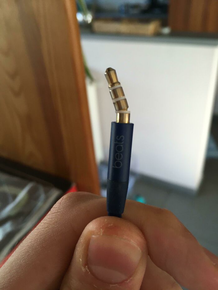 A bent headphone jack from Beats, symbolizing a way worse day.