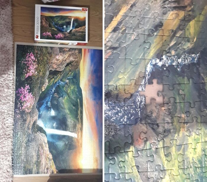 A completed waterfall jigsaw puzzle with one missing piece, showing a way worse day.
