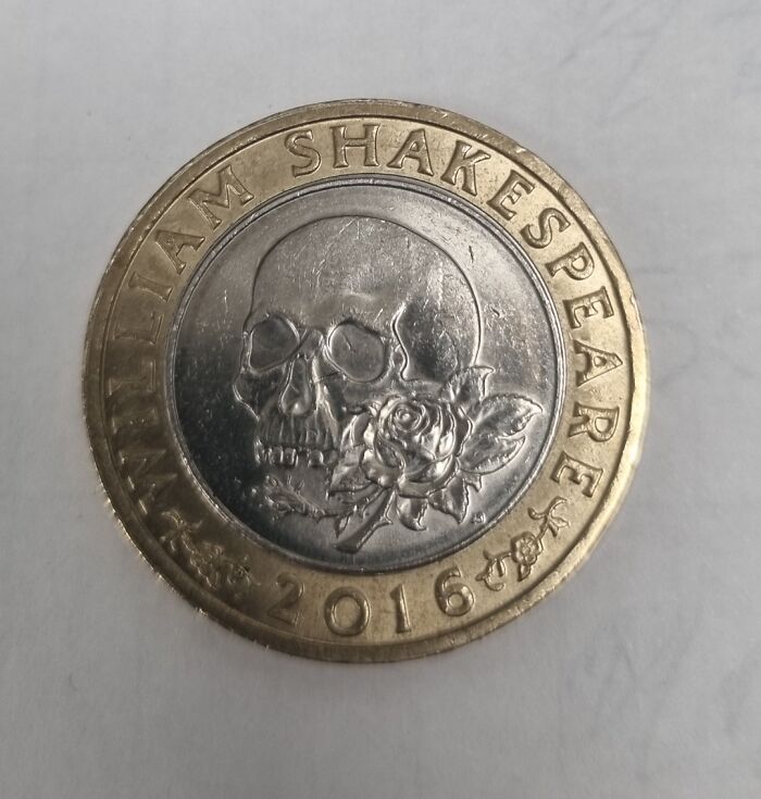 A William Shakespeare 2016 coin featuring a skull and rose, a brilliant designer transformation of ordinary things.