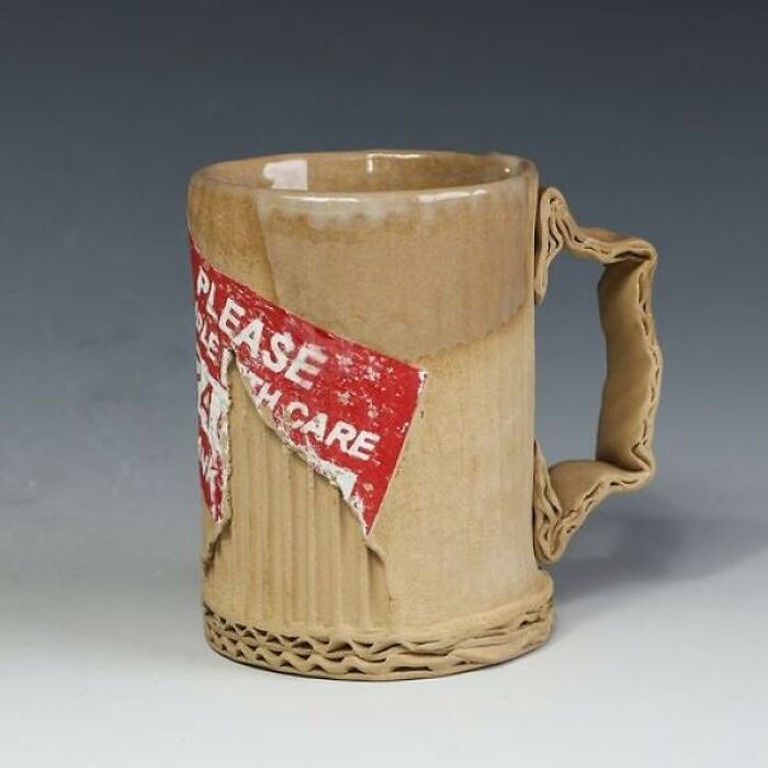 A unique cardboard-textured mug with a torn PLEASE HANDLE WITH CARE sticker, showing brilliantly transformed ordinary things.