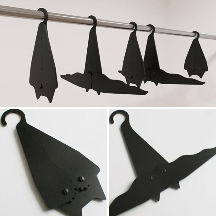 Black metal bat-shaped hangers, an example of designers transforming ordinary things brilliantly.