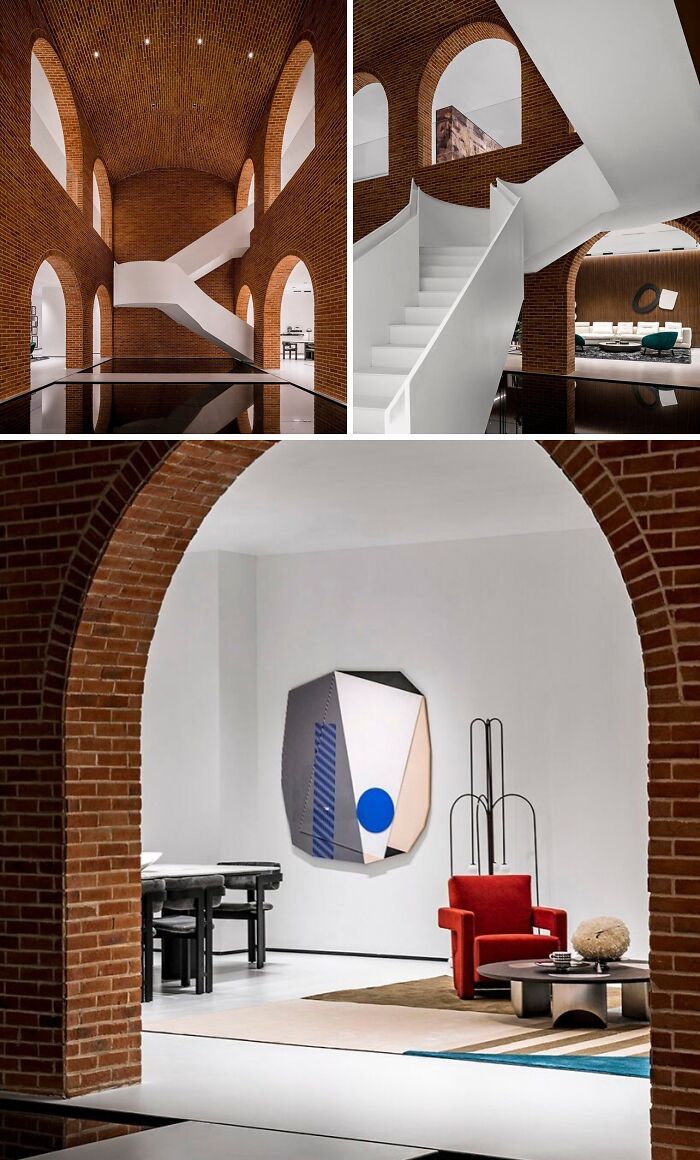An interior with brilliant design choices, showcasing brick arches, white staircases, and modern art.