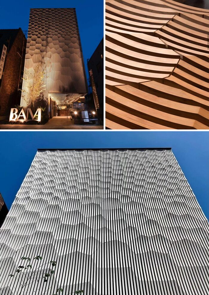 A building with brilliant design choices, featuring a unique facade of vertical slats and wavy patterns.