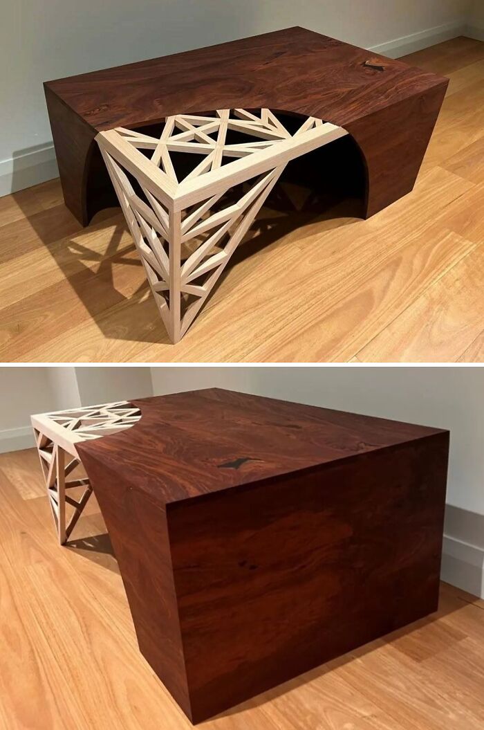A brilliant design choice for a unique wooden table with a contrasting geometric support structure visible from below.