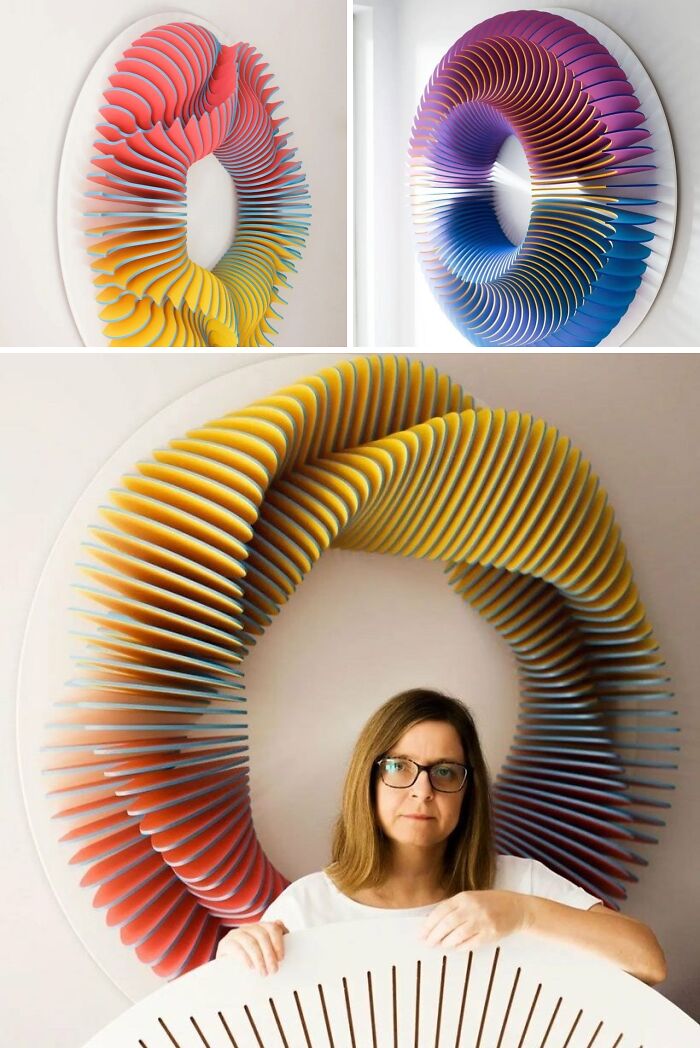 A vibrant, spiraling circular wall art piece with a woman in front, showcasing brilliant design choices in optical art.