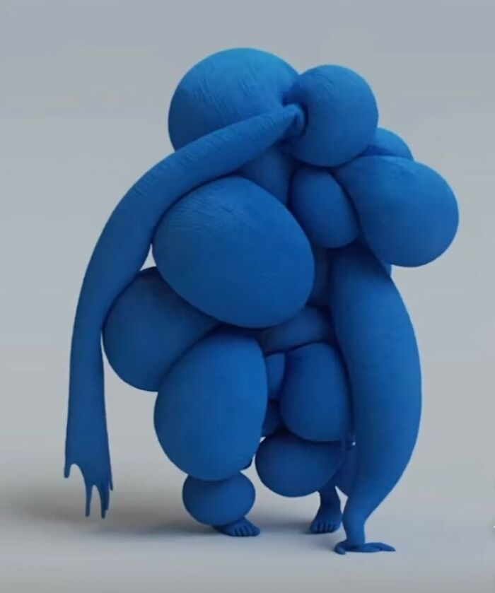 A blue, blob-like figure, part of the bizarre content featured on the Zara website.