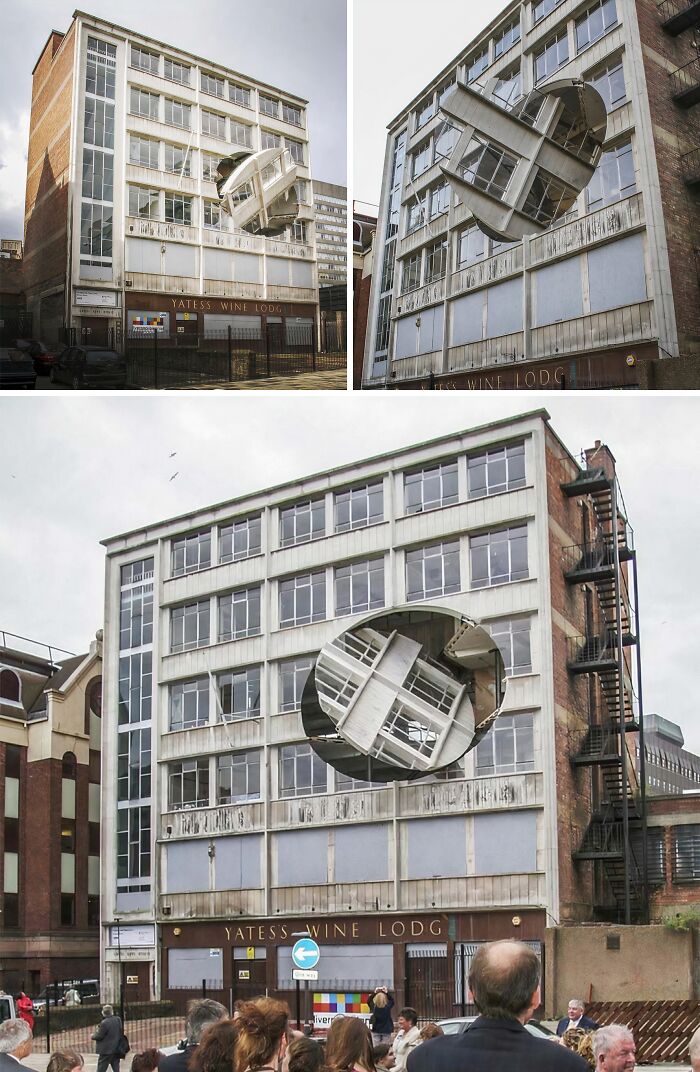 An art installation showcasing brilliant design choices where a part of a building appears to have fallen out.