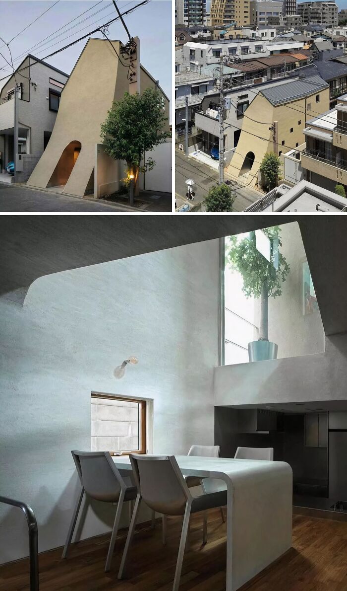 A unique, narrow house with a curved facade and an archway, showcasing brilliant design choices in a dense neighborhood.