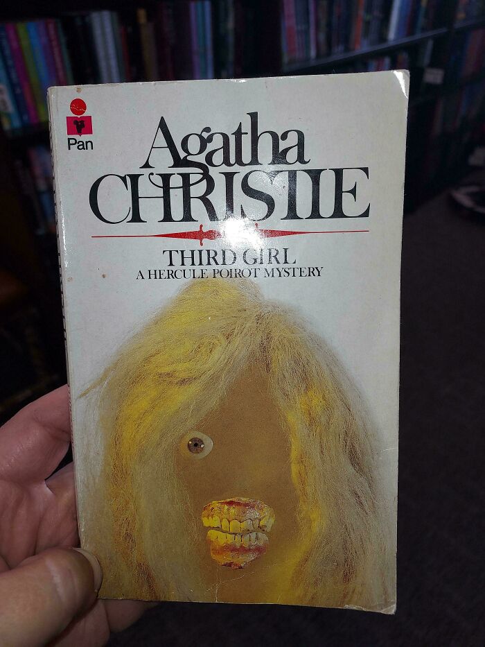 Unhinged book cover of Agatha Christie Third Girl featuring a creepy doll face with one eye.