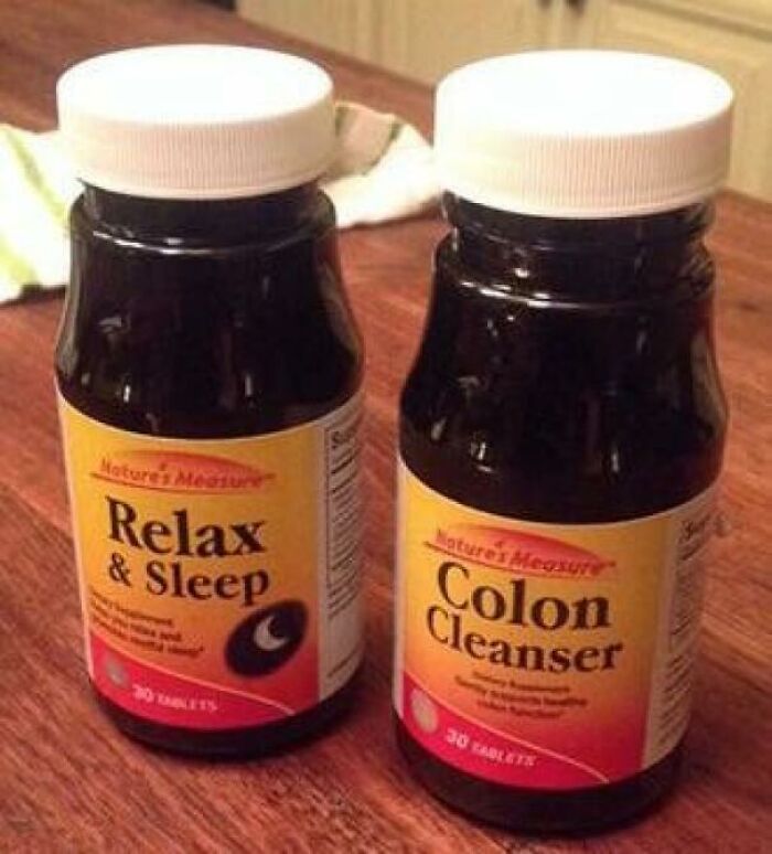 An awful design fail with two bottles of supplements, one labeled Relax & Sleep and the other Colon Cleanser, side by side.