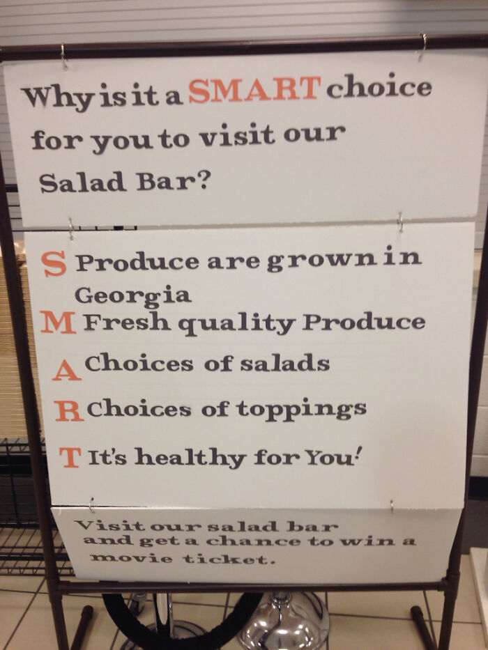 A sign promoting a salad bar, but with an awful design fail where the acronym makes no sense, a design fail.