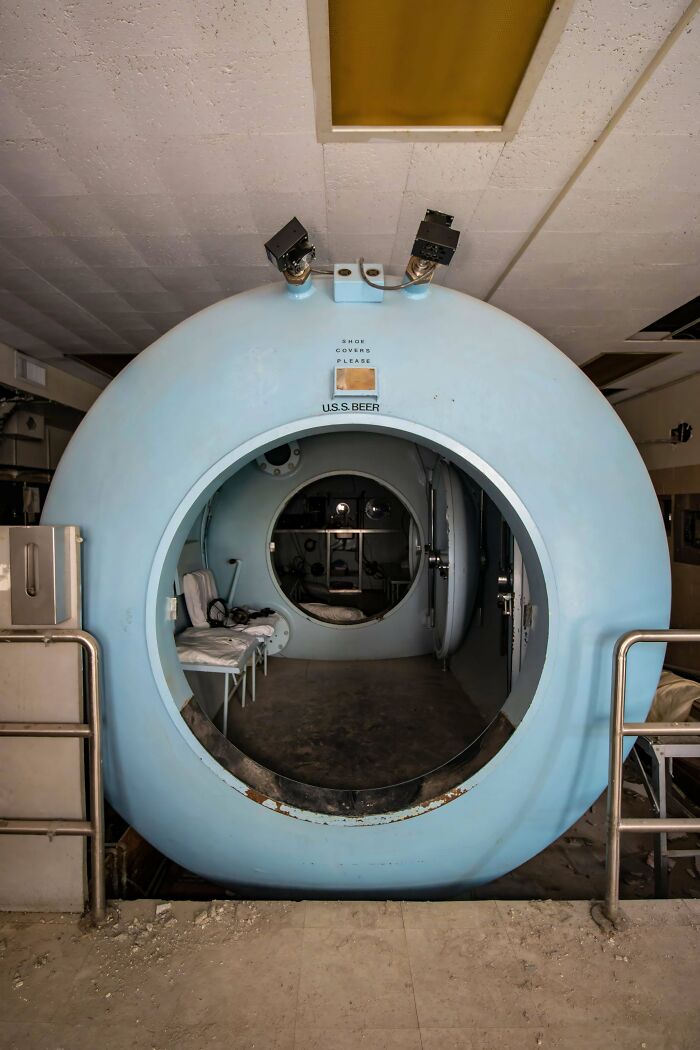 Urban explorers discovered a blue, cylindrical chamber labeled U.S.S. BEER, an unexpected find.