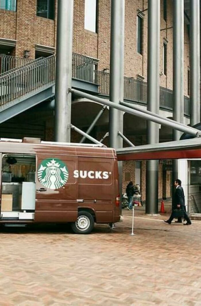 An awful design fail showing a Starbucks van with the word S***S written on its side.