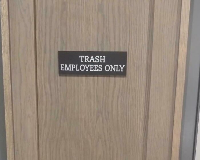 A door with a sign reading Trash Employees Only, a hilariously awful design fail.