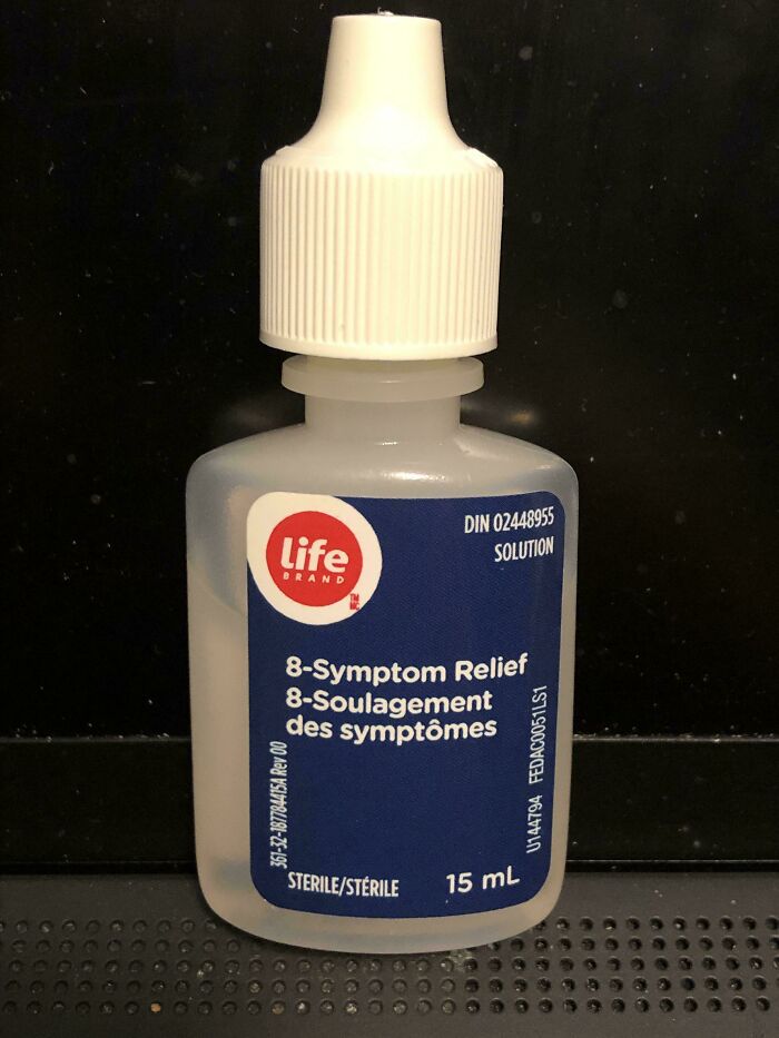 Hilariously awful design fail: An 8-symptom relief bottle with French text poorly aligned, a clear design fail.