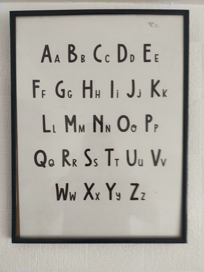 An alphabet poster with inconsistent uppercase and lowercase letters, a hilariously awful design fail.