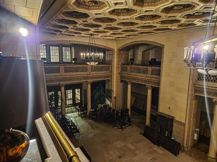 Urban explorers discovered a grand hall with ornate ceilings and chandeliers.