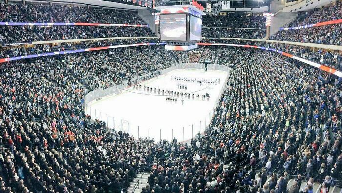 An aerial view of a packed arena with an ice rink, highlighting the fascinating differences in the USA.