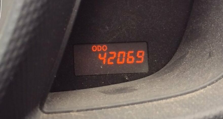 A car odometer displaying 42069, an amusing sight that can improve your day.