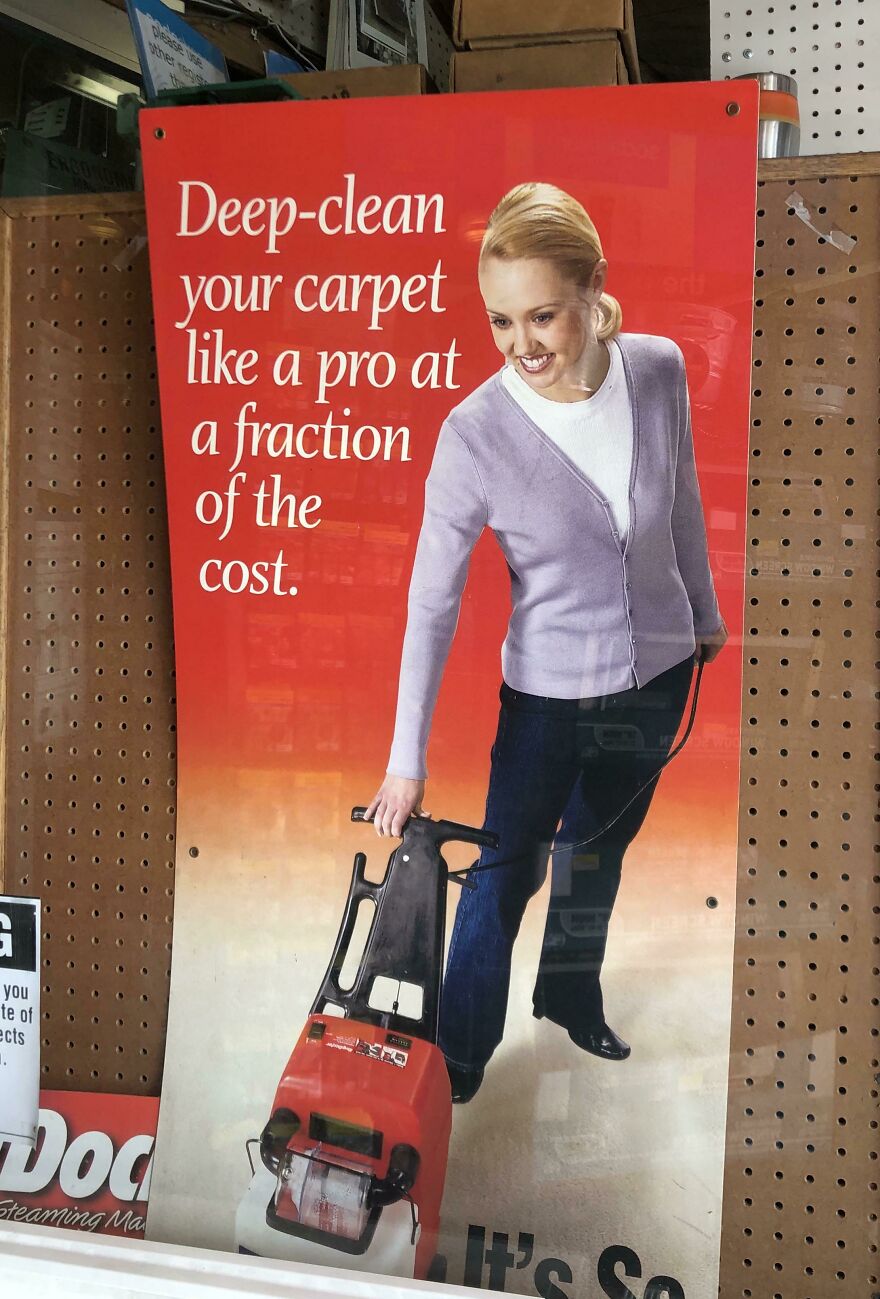 An advertisement poster for deep-cleaning carpets, featuring a smiling woman using a carpet cleaner. Mildly amusing things.
