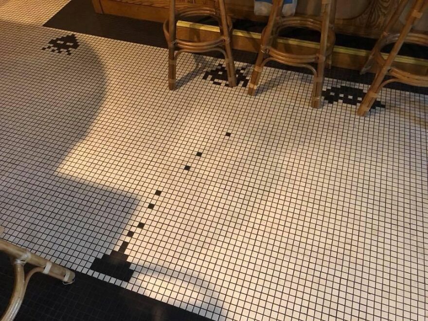 Floor tiles with Space Invaders patterns, offering mildly amusing things for your day.