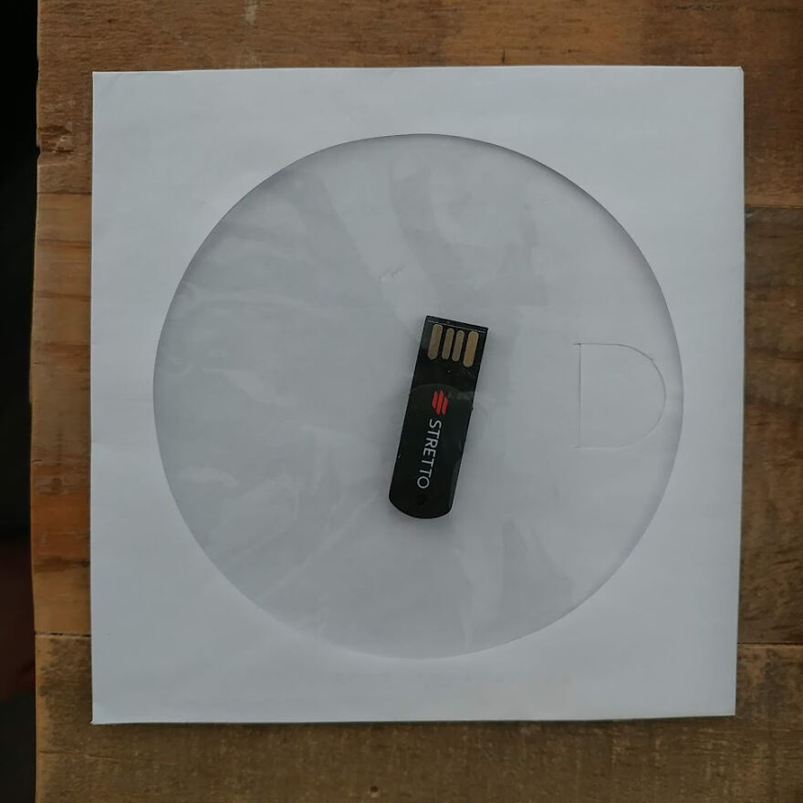 A black USB stick with STRETTIO logo inside a clear CD sleeve, one of many amusing things.