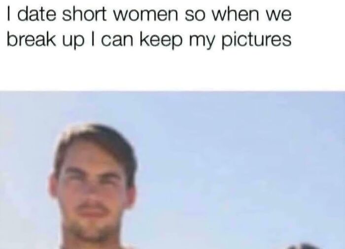 A dating meme showing a man looking serious with only the top half of a woman visible next to him, illustrating a joke about short women.