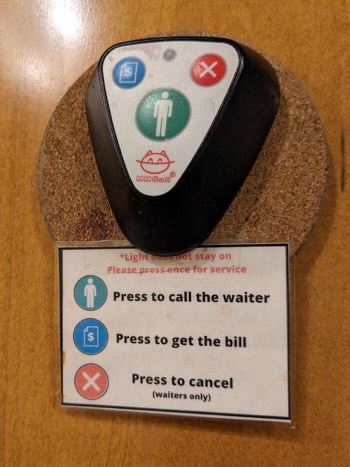 A surprisingly simple and genius idea of a table buzzer to call a waiter, get the bill, or cancel.
