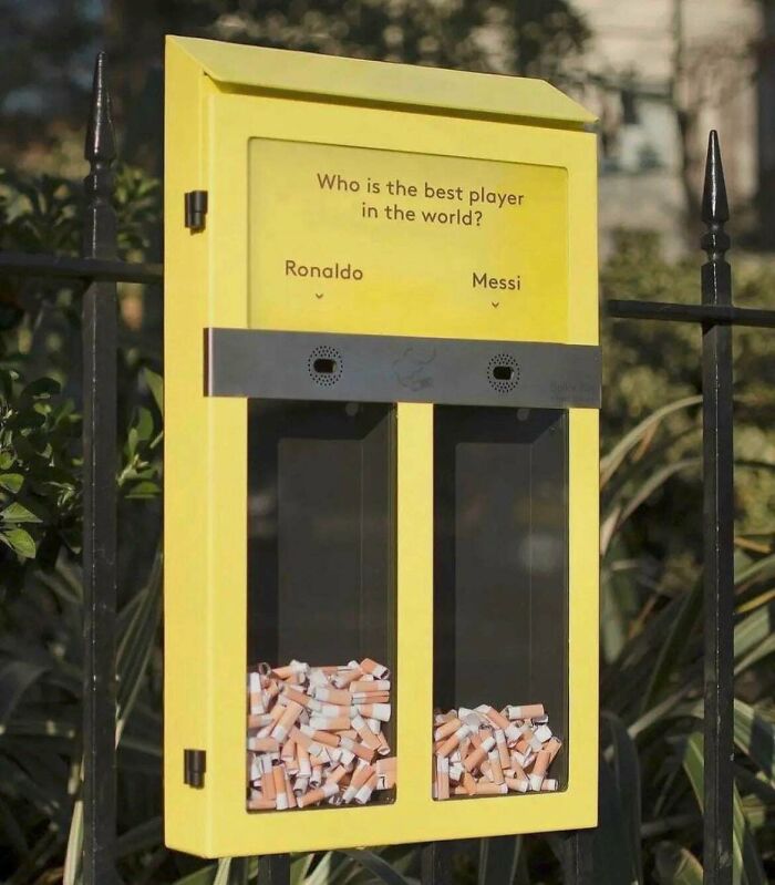 A yellow public ash tray posing the question Who is the best player in the world?, a simple, genius idea.