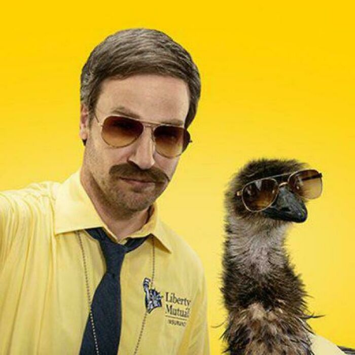 A man with a mustache and aviator sunglasses next to an emu, both wearing sunglasses, from a famous commercial.