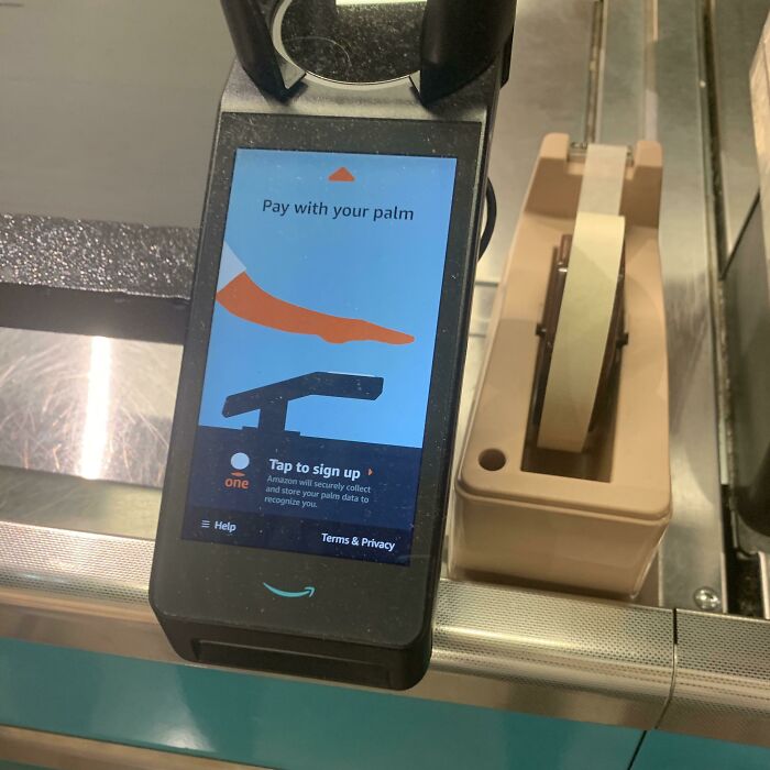 A close-up of a payment terminal for solving everyday problems with genius ideas to pay with your palm.