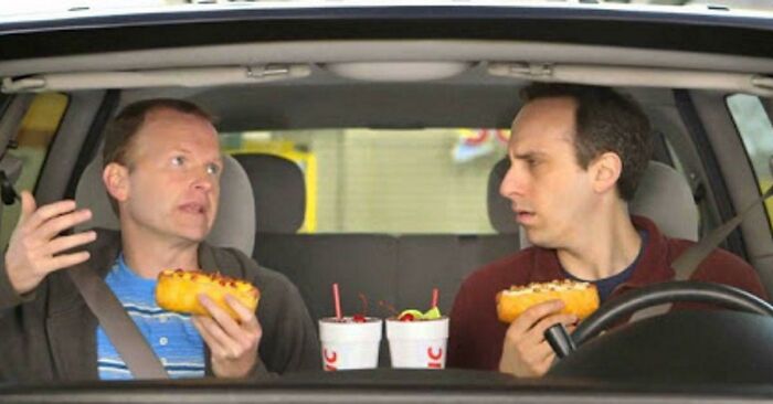 Two men eating in a car, part of a collection of commercials people can't stand.