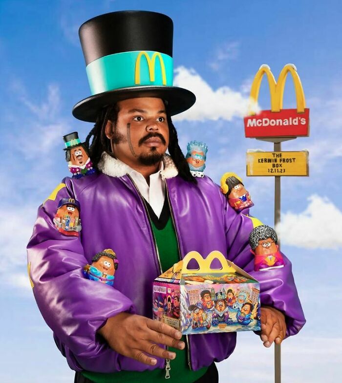 A man in a top hat with a McDonald's logo and a purple jacket, holding a Happy Meal, from commercials people cant stand.