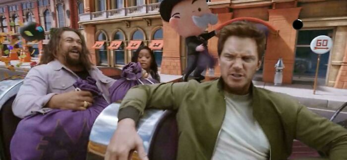 Jason Momoa and Chris Pratt in a scene from a commercial, portraying their dislike for certain commercials.