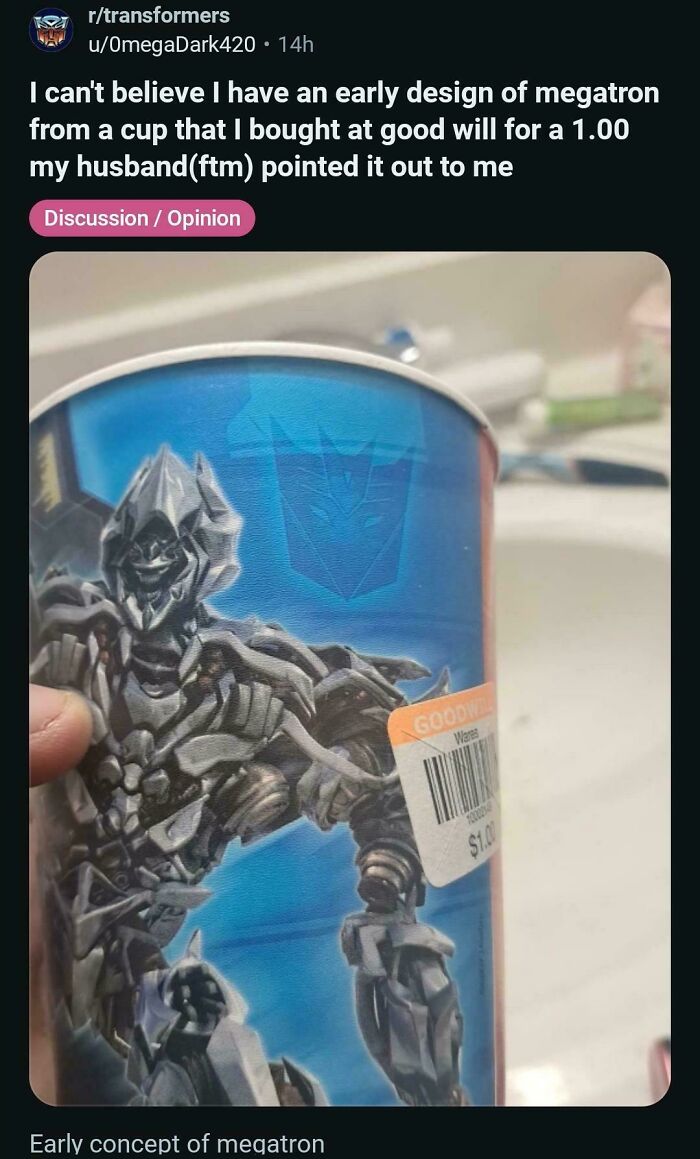 An image showing an unhinged early Megatron design on a cup bought from Goodwill.