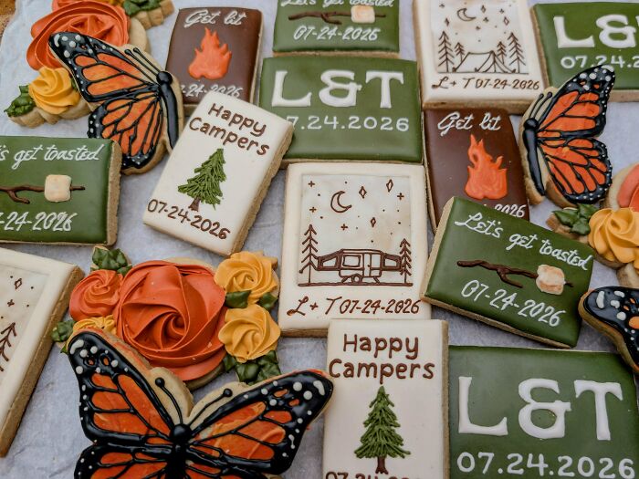 Assortment of camping-themed cookies with butterflies and flowers, amazing and delicious treats by bakers.