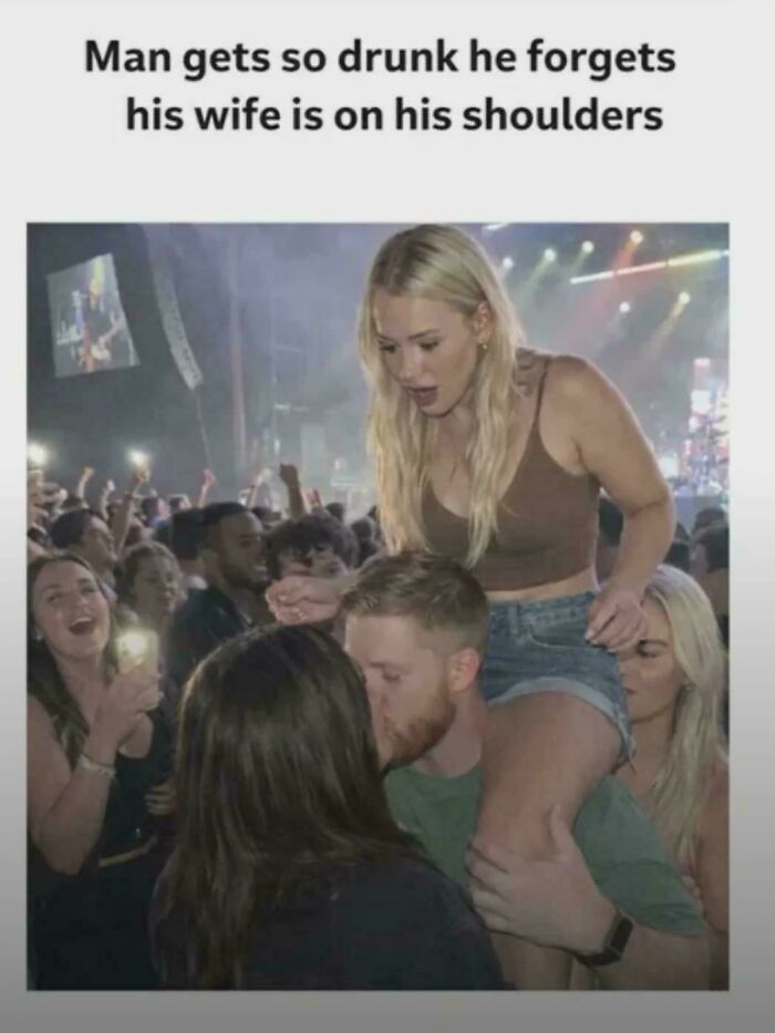 A blursed meme of a man kissing a woman while his wife is on his shoulders at a concert.