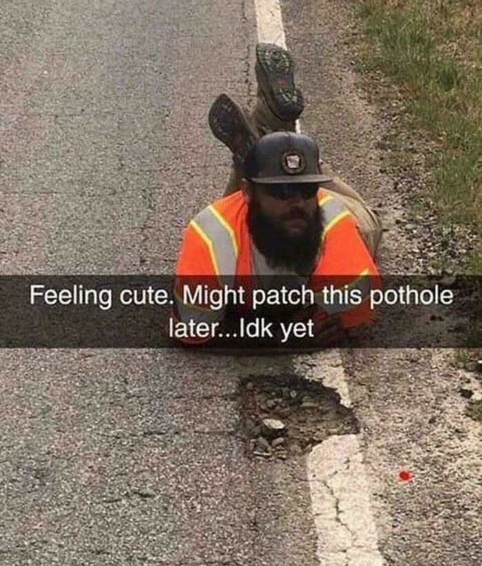 A blursed meme of a man lying on the road with a caption about patching a pothole later.