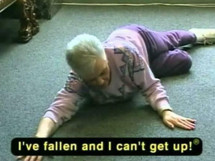 An older woman on the floor saying, I've fallen and I can't get up!, a famous line from a memorable commercial.