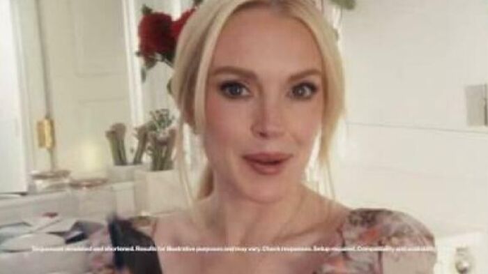 A blonde woman looking directly at the camera, featured in commercials people can't stand.